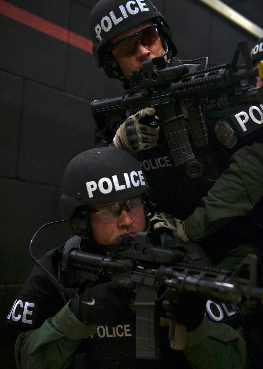 Noblesville elite policmen conduct live fire shoot house training at Camp Atterbury, Ind.