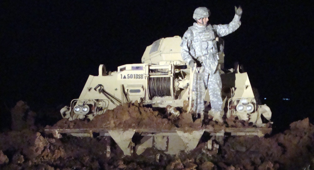 'Ready First' Soldiers Work Day, Night to Recover Vehicles