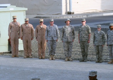 Deployed medical group Airmen lead Southwest Asia wing's retreat ceremony