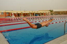 Competitors swim, run on Armed Forces Day at Balad