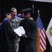 Service members graduate while deployed