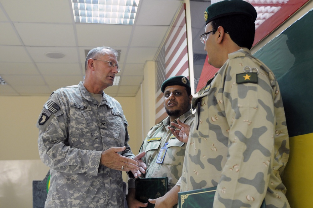 Col. Mark McGuire, commander, 3rd Medical Deployment Sustainment Command, speaks with Kuwaiti National Guardsmen who graduated from the Vehicle Evacuation Exercise May 27. McGuire, a reservist from Auburn, Al. who is an Optometrist for a Veteran's Affairs