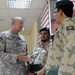 Col. Mark McGuire, commander, 3rd Medical Deployment Sustainment Command, speaks with Kuwaiti National Guardsmen who graduated from the Vehicle Evacuation Exercise May 27. McGuire, a reservist from Auburn, Al. who is an Optometrist for a Veteran's Affairs