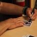 Michael Peterson Meets and Signs Autographs for U.S. Soldiers