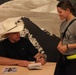 Michael Peterson Meets and Signs Autographs for U.S. Soldiers