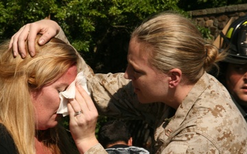 Marine Provides First Aid at NYC Fleet Week Helicopter Raid