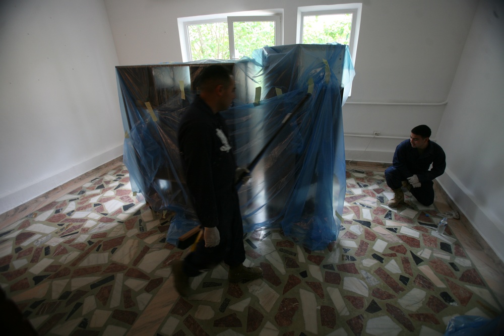 Marines, Sailors volunteer to improve home for HIV-positive Romanian teens
