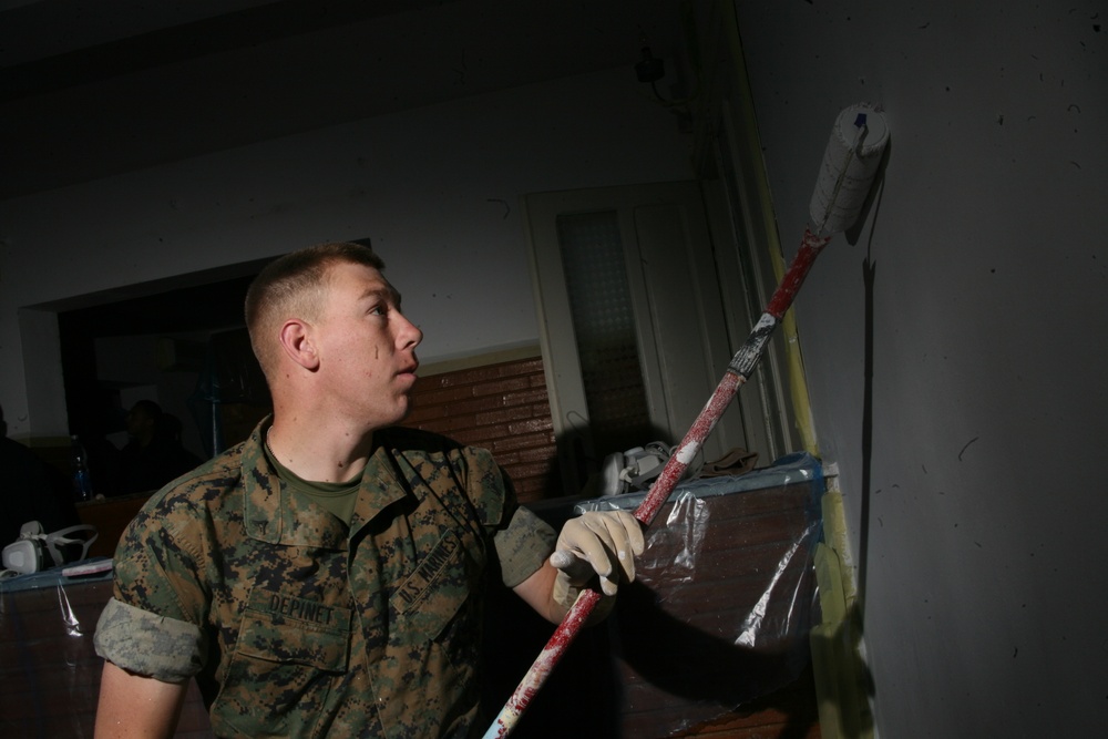 Marines, Sailors volunteer to improve home for HIV-positive Romanian teens