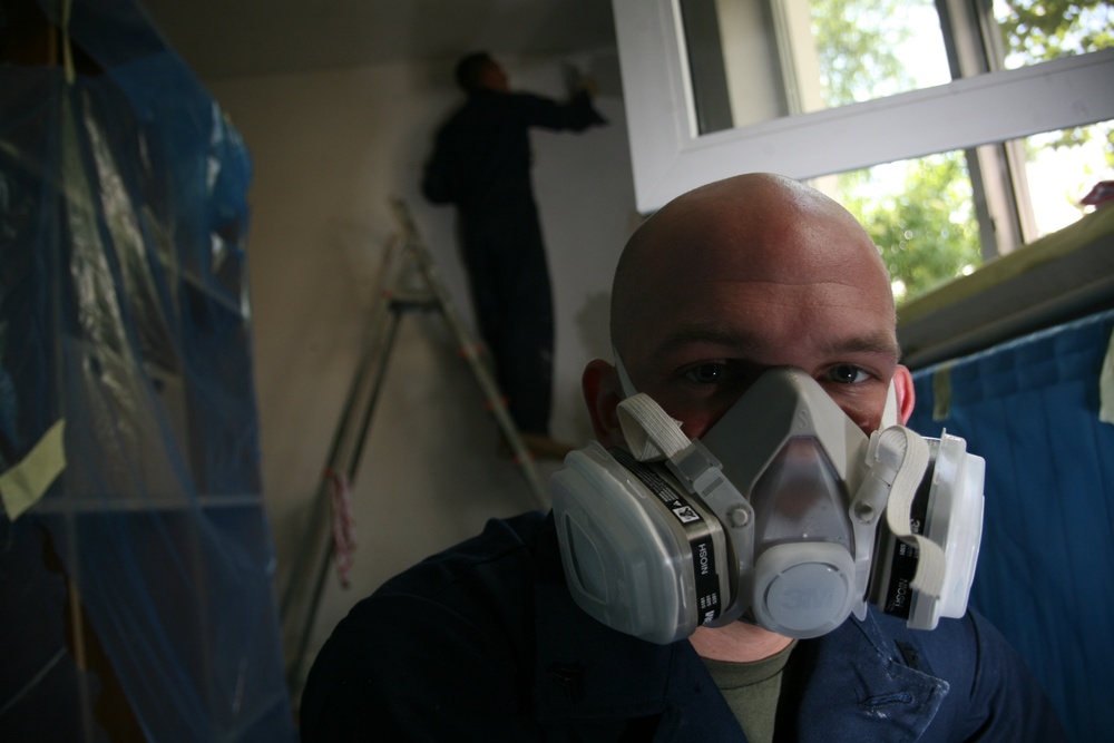 Marines, Sailors volunteer to improve home for HIV-positive Romanian teens