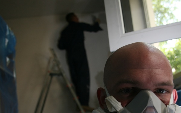 Marines, Sailors volunteer to improve home for HIV-positive Romanian teens