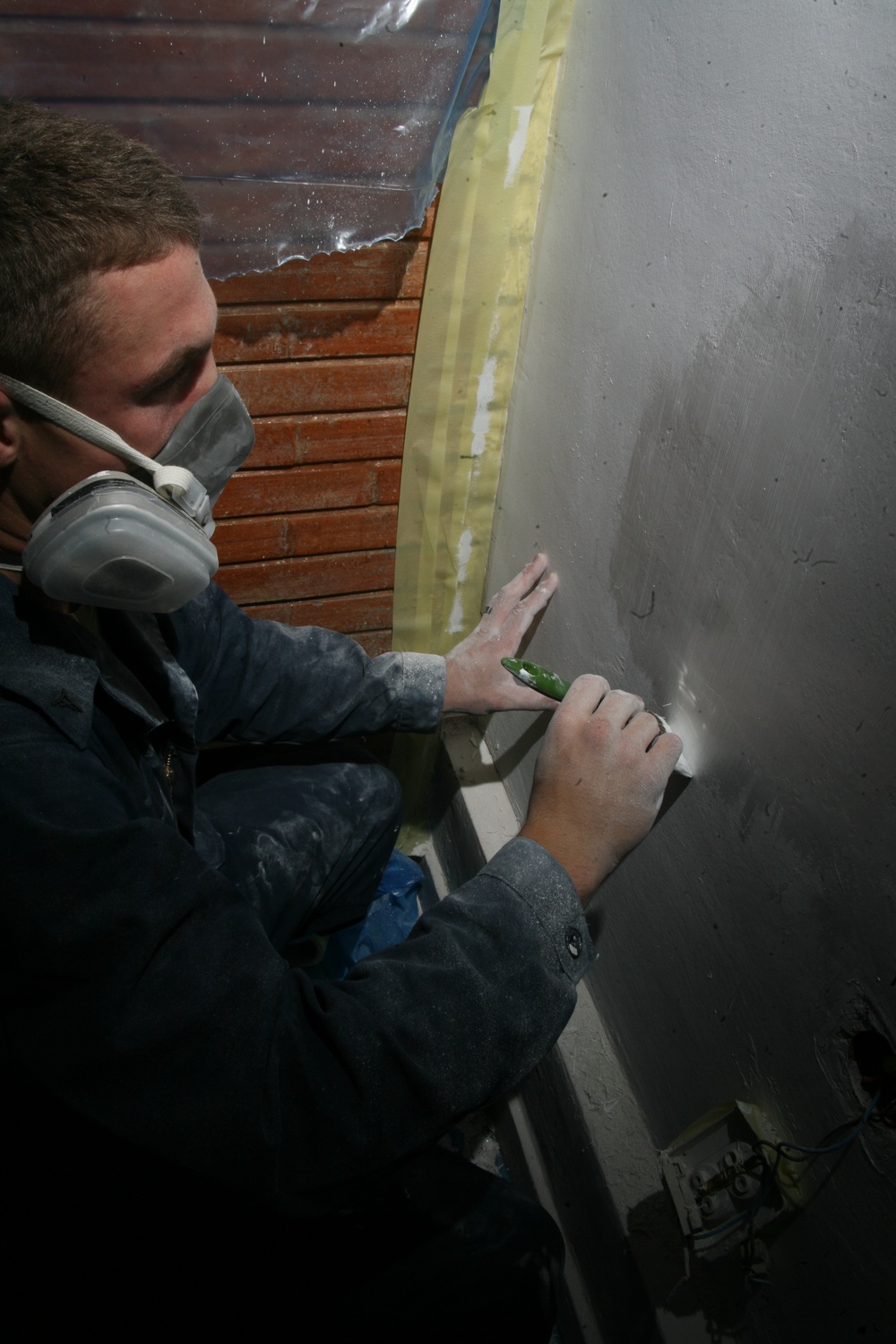 Marines, Sailors volunteer to improve home for HIV-positive Romanian teens