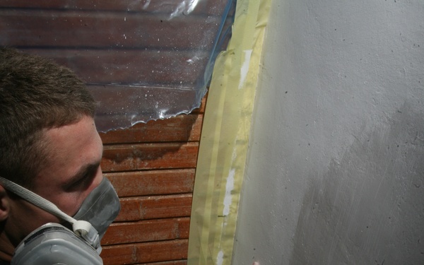 Marines, Sailors volunteer to improve home for HIV-positive Romanian teens