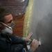 Marines, Sailors volunteer to improve home for HIV-positive Romanian teens