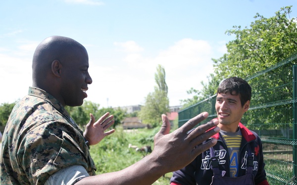 Marines, Sailors volunteer to improve home for HIV-positive Romanian teens