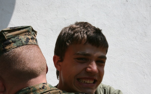 Marines, Sailors volunteer to improve home for HIV-positive Romanian teens