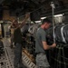 Airman Inspects Delivery Bundles
