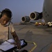 Airman Inspects Delivery Bundles