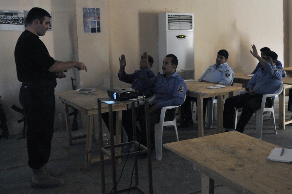Taji Law Enforcement Academy Graduates Last Class of Iraqi Police