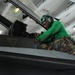 Sailors maintain aircraft aboard USS Dwight D. Eisenhower