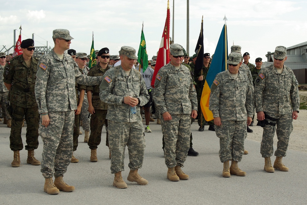 NATO forces march in Kosovo, Iraq and Afghanistan in memory of fallen