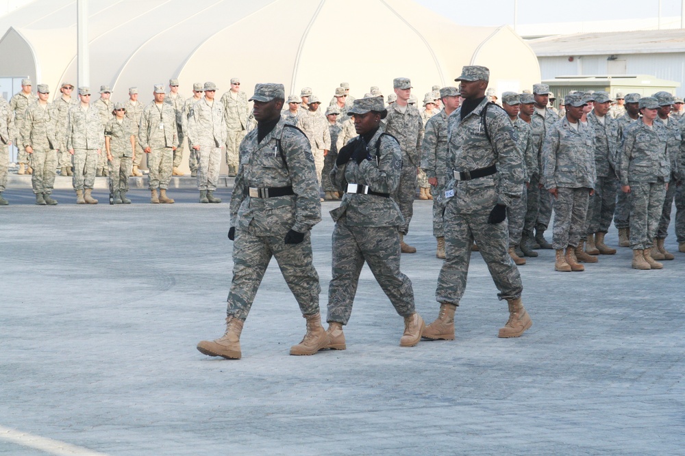 Medical Group Airmen Lead Deployed Retreat Ceremony