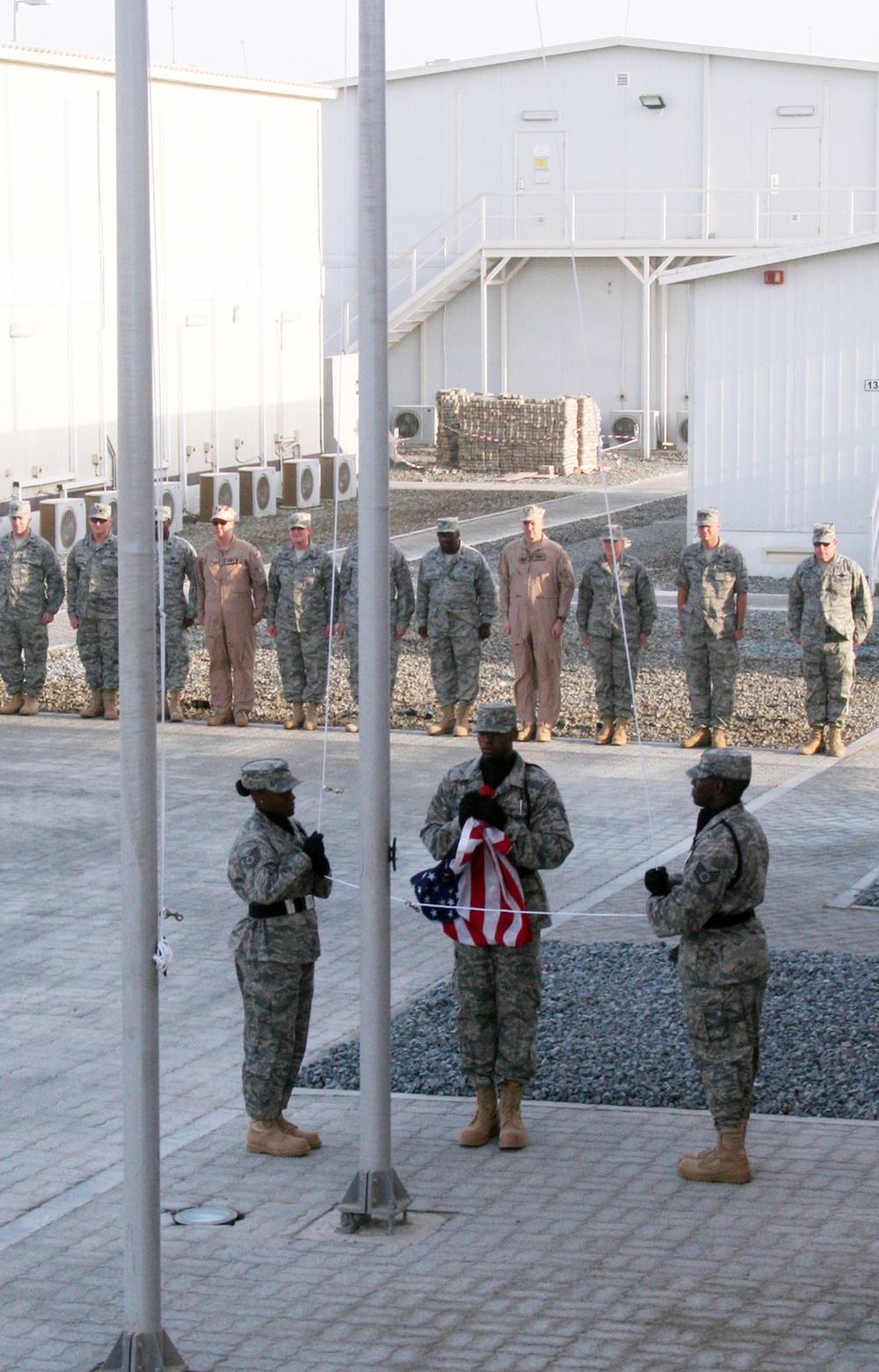 Medical Group Airmen Lead Deployed Retreat Ceremony