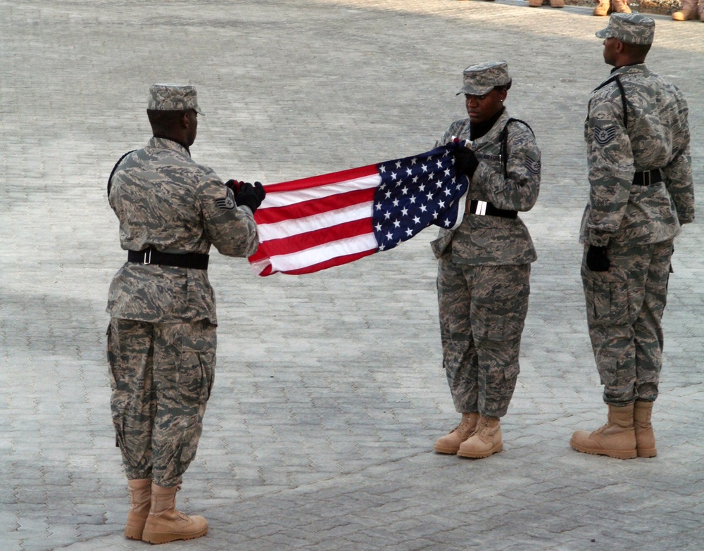 Medical Group Airmen Lead Deployed Retreat Ceremony