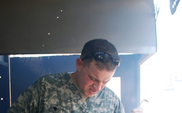 Where the Steaks Are Hot: Falcon Cafe's Soldiers Operate the Largest Soldier-run Dining Facility in Afghanistan