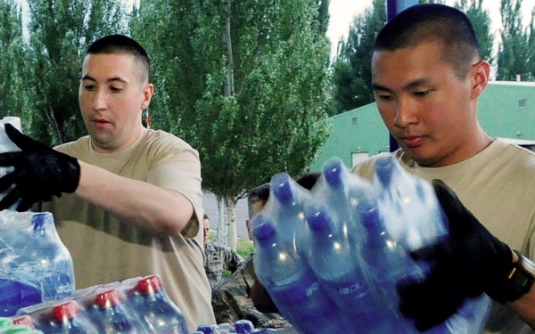 Airmen purchase, deliver food for Osh