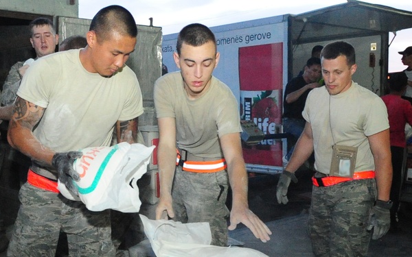 Airmen purchase, deliver food for Osh