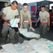 Airmen purchase, deliver food for Osh