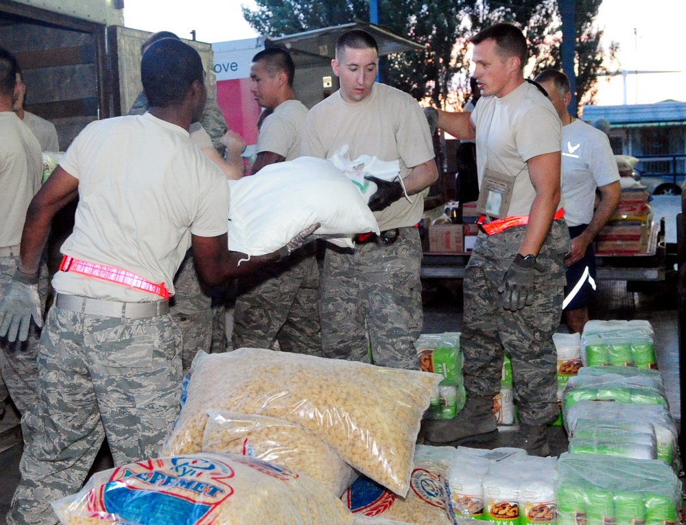 Airmen purchase, deliver food for Osh
