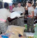 Airmen purchase, deliver food for Osh