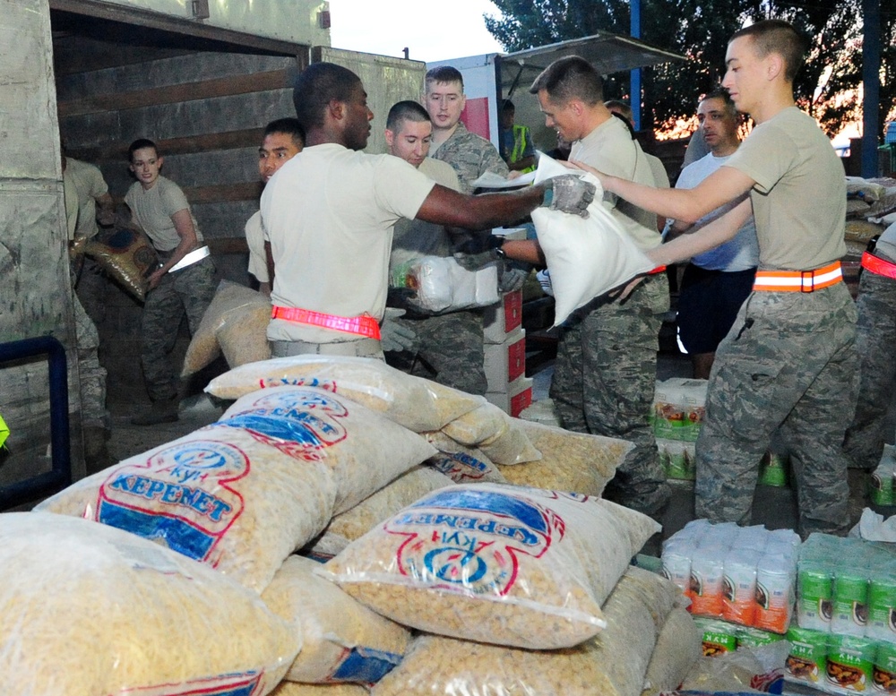 Airmen purchase, deliver food for Osh