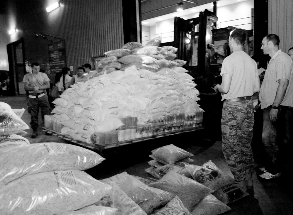 Airmen purchase, deliver food for Osh