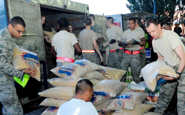Airmen purchase, deliver food for Osh