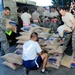 Airmen purchase, deliver food for Osh