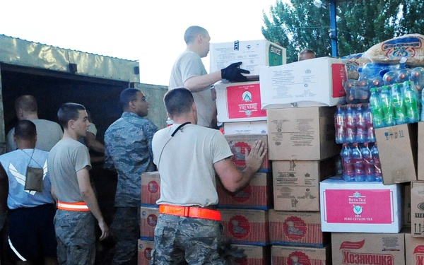 Airmen purchase, deliver food for Osh