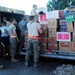 Airmen purchase, deliver food for Osh