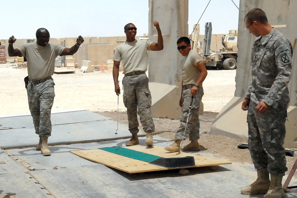 Soldiers play golf at Contingency Operating Station Hammer