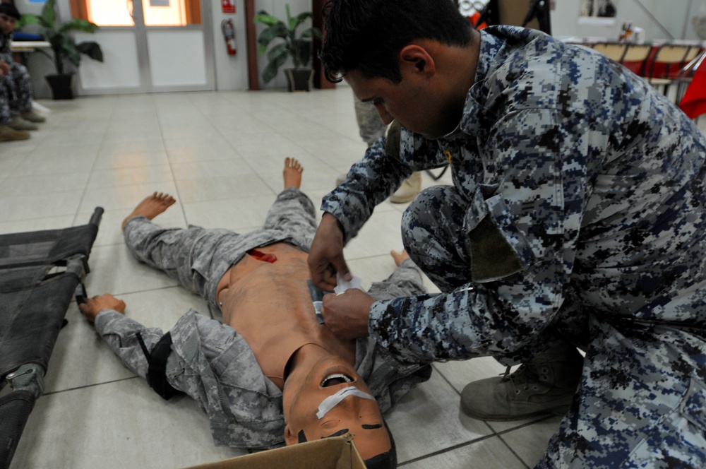 72nd IBCT and Iraq's Federal Police Team Up for Tactical Field Care Training in Baghdad