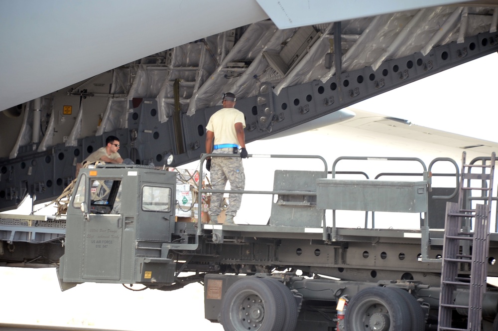 Aerial Porters Use Aircraft Loaders for Operations in Southwest Asia