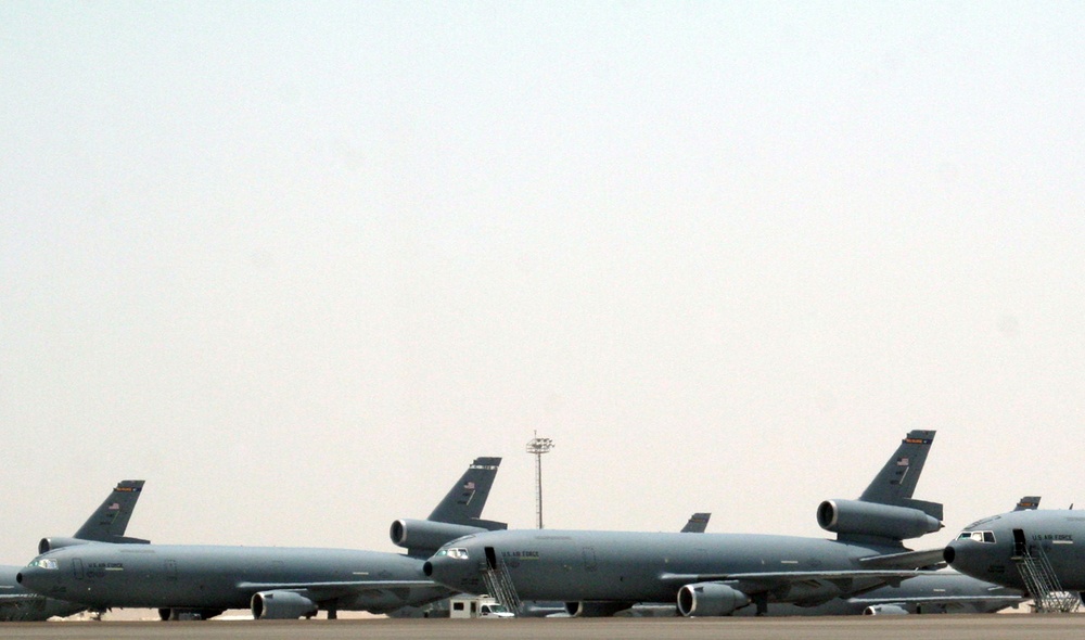 KC-10 Extenders assigned to the 908th Expeditionary Air Refueling Squadron are parked on the flightline for the 380th Air Expeditionary Wing at a non-disclosed base in Southwest Asia on May 19, 2010. KC-10s and the Airmen who support and fly them are depl