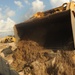 Louisiana National Guardsmen construct a Hesco Concertainer barrier wall along portions of the Cameron Parish coastline