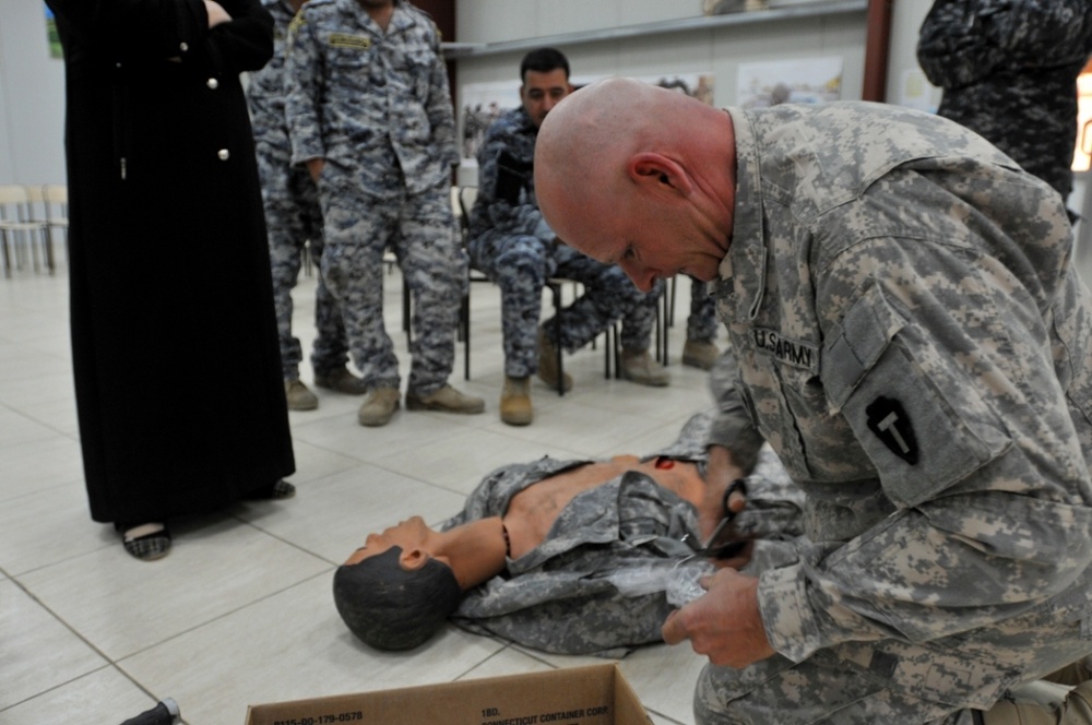 HHC 72nd IBCT Instructs Soldiers and Iraq's Federal Police in Combat Lifesaving at Baghdad Facility