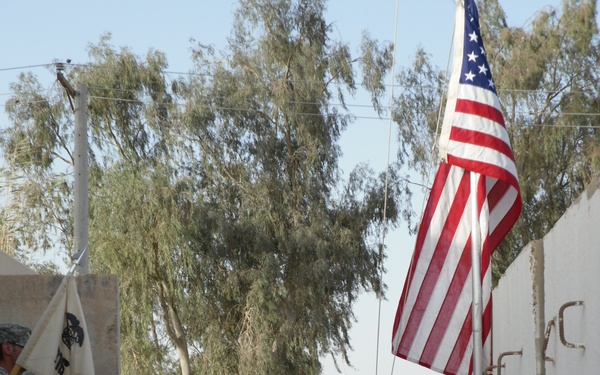 QM Soldiers erect flagpole, exercise traditions