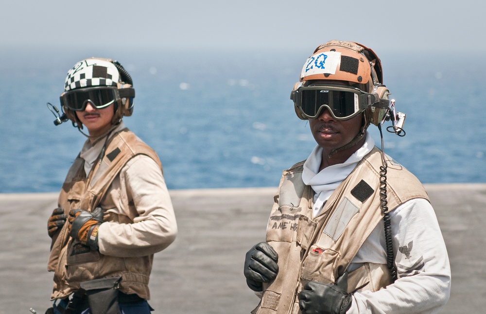 Crew members Awaits a F/A-18 Hornet Launch