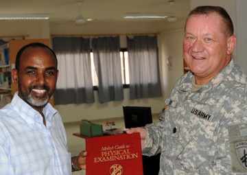 Civil Affairs Battalion Donates Books to Djiboutian Medical School