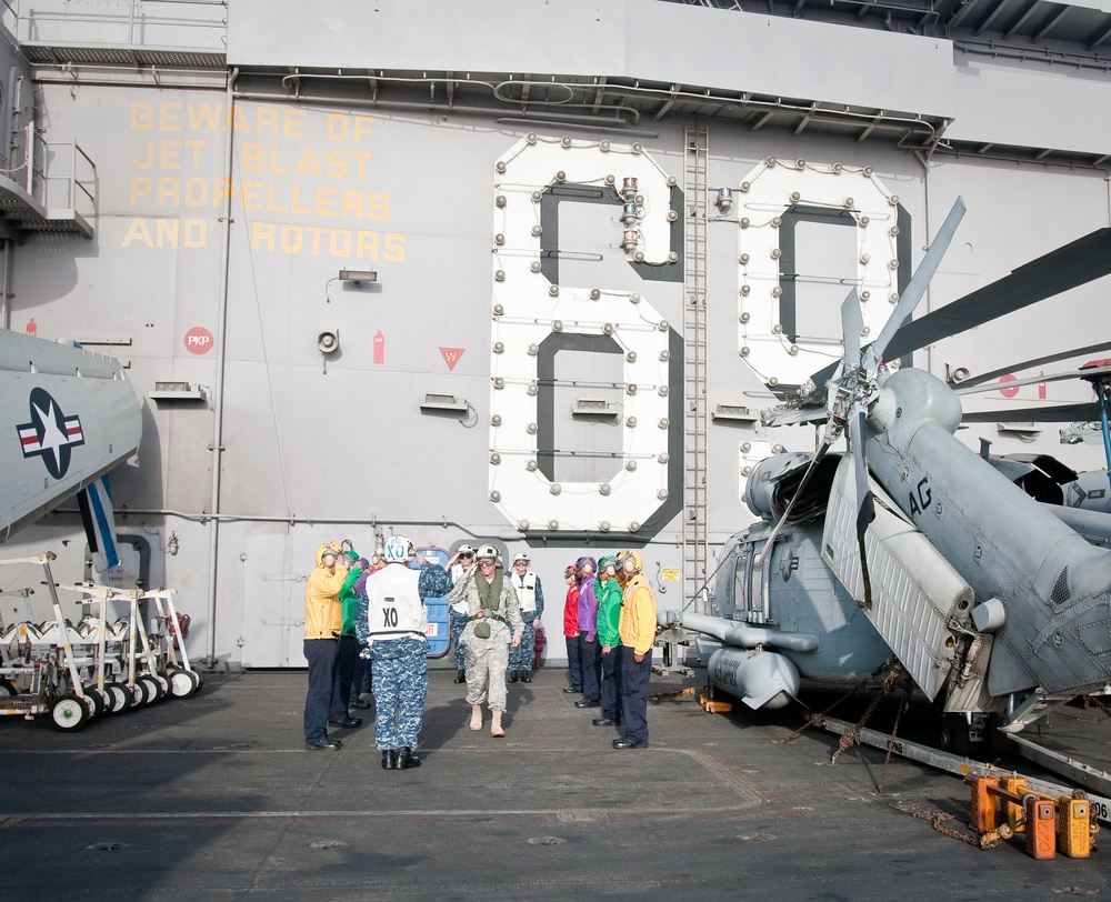 Gen. McChrystal Departs Aircraft Carrier