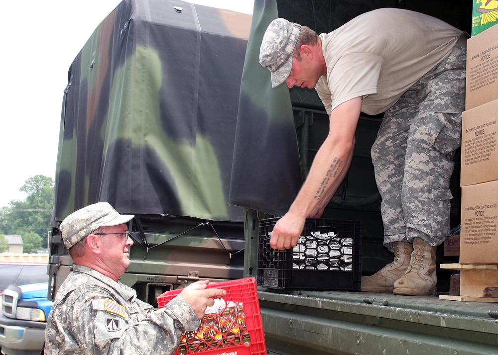 Army Food Service Workers Serve Soldiers